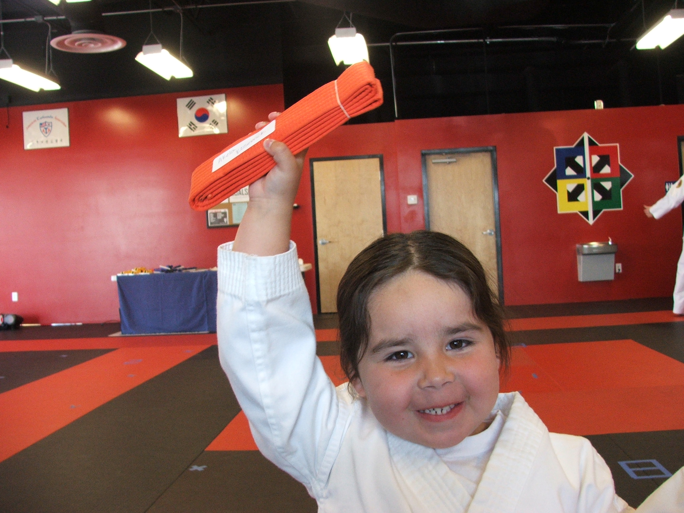 Akela's New Orange Belt